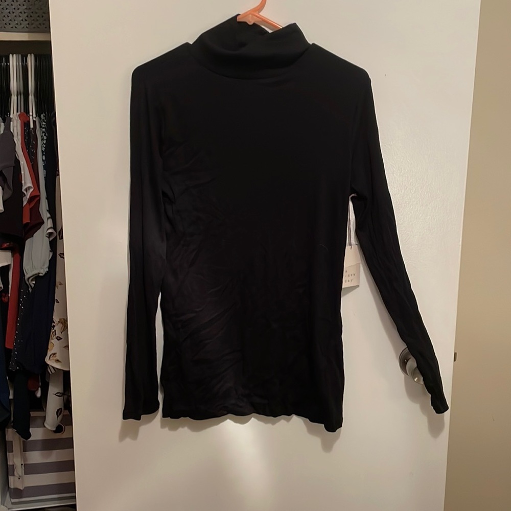 A new day turtle neck